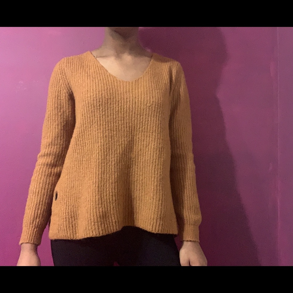 Orange knitted sweater